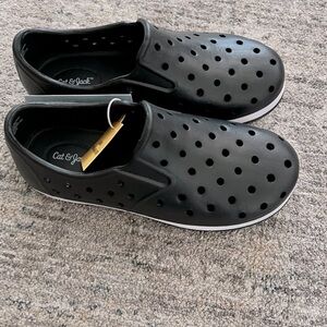 Brand new Cat + Jack slip on shoes for boy or girl. Black + white. Never worn!